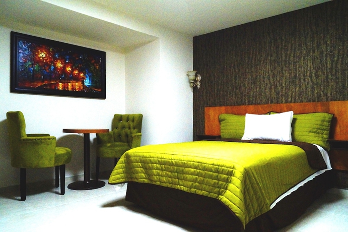 Imagen de la habitación del Hotel Royal Madero Inn. Foto 4