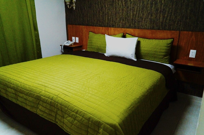 Imagen de la habitación del Hotel Royal Madero Inn. Foto 5