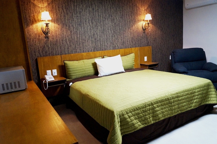 Imagen de la habitación del Hotel Royal Madero Inn. Foto 6
