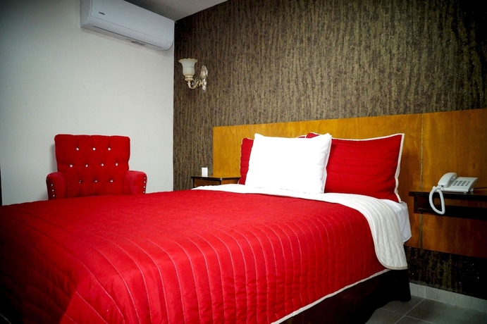 Imagen de la habitación del Hotel Royal Madero Inn. Foto 8