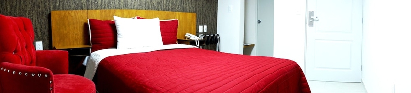 Imagen de la habitación del Hotel Royal Madero Inn. Foto 9