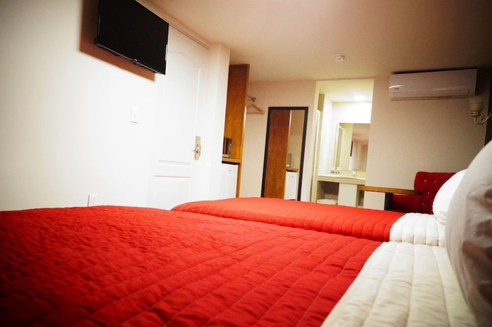 Imagen de la habitación del Hotel Royal Madero Inn. Foto 12