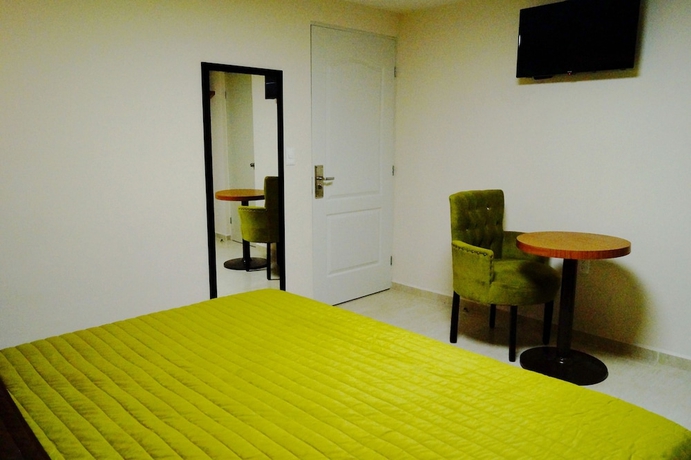 Imagen de la habitación del Hotel Royal Madero Inn. Foto 16