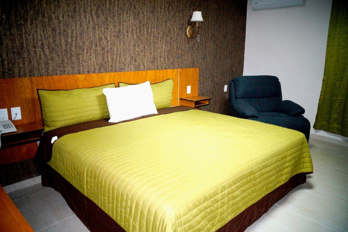 Imagen de la habitación del Hotel Royal Madero Inn. Foto 18