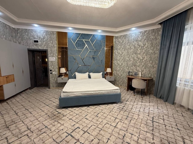 Imagen de la habitación del Hotel Royal Navoi. Foto 2