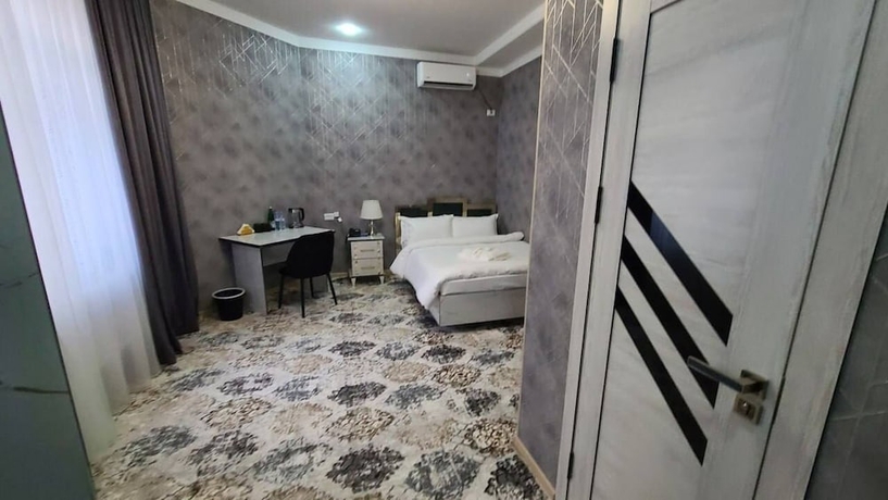 Imagen de la habitación del Hotel Royal Navoi. Foto 3