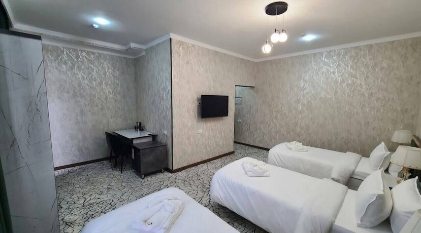 Imagen de la habitación del Hotel Royal Navoi. Foto 5