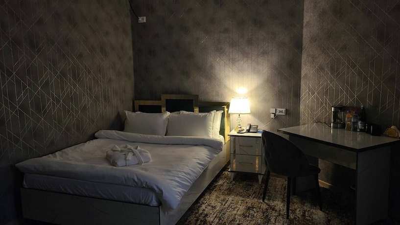 Imagen de la habitación del Hotel Royal Navoi. Foto 7