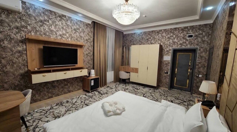 Imagen de la habitación del Hotel Royal Navoi. Foto 11