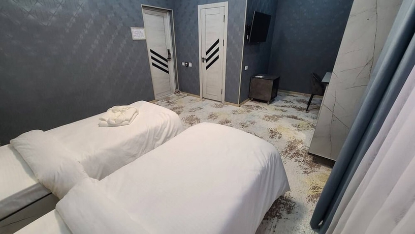 Imagen de la habitación del Hotel Royal Navoi. Foto 13