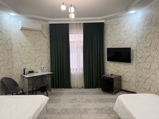 Imagen de la habitación del Hotel Royal Navoi. Foto 14