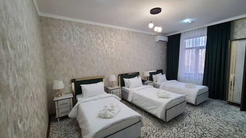 Imagen de la habitación del Hotel Royal Navoi. Foto 15