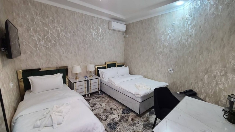 Imagen de la habitación del Hotel Royal Navoi. Foto 16