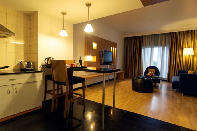 Imagen de la habitación del Hotel Royal Orchid Bangalore. Foto 8