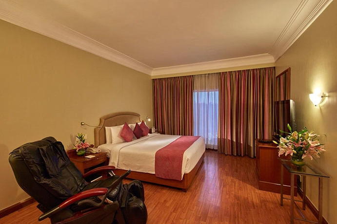 Imagen de la habitación del Hotel Royal Orchid Bangalore. Foto 10