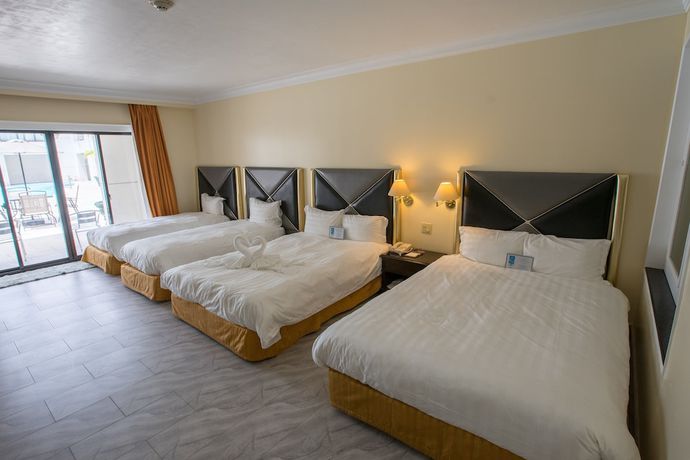 Imagen de la habitación del Hotel Royal Orchid Guam. Foto 7