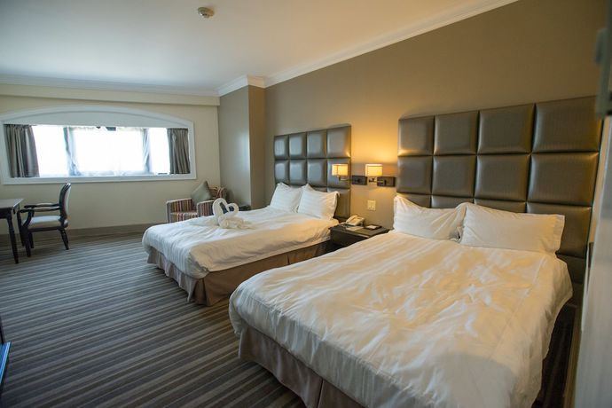 Imagen de la habitación del Hotel Royal Orchid Guam. Foto 10