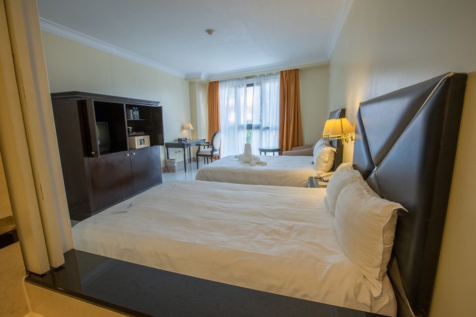 Imagen de la habitación del Hotel Royal Orchid Guam. Foto 11