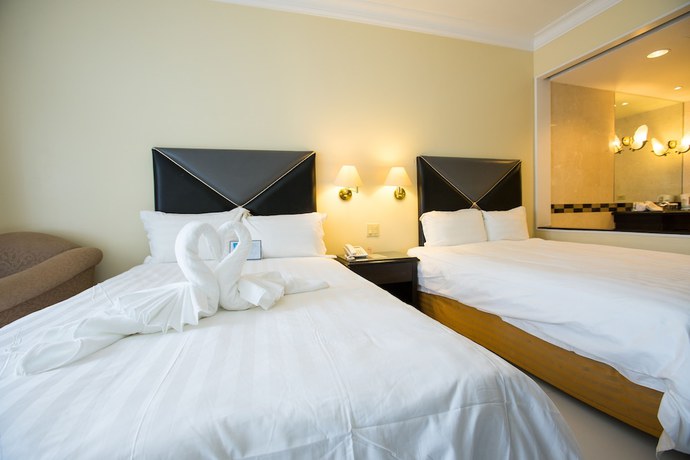Imagen de la habitación del Hotel Royal Orchid Guam. Foto 14