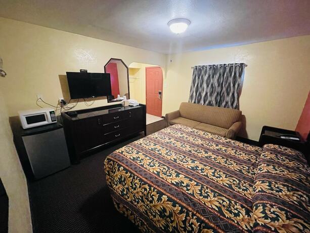 Imagen de la habitación del Hotel Royal Palms Motel. Foto 14