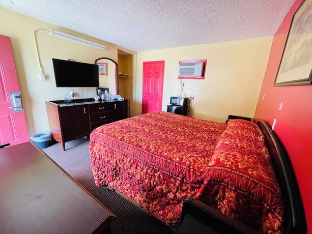Imagen de la habitación del Hotel Royal Palms Motel. Foto 15