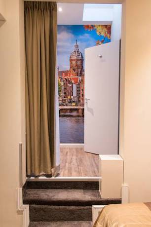 Imagen de la habitación del Hotel Royal Plaza Amsterdam. Foto 6