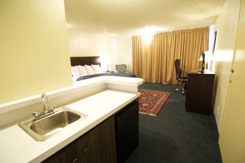 Imagen de la habitación del Hotel Royal Plaza Inn Indio. Foto 7