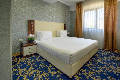 Imagen de la habitación del Hotel Royal Plaza by Stellars, Yerevan. Foto 13