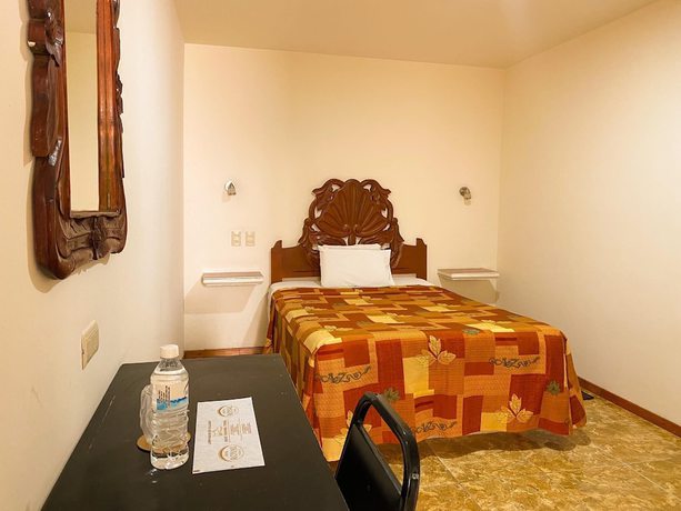 Imagen de la habitación del Hotel Royal Puebla. Foto 11