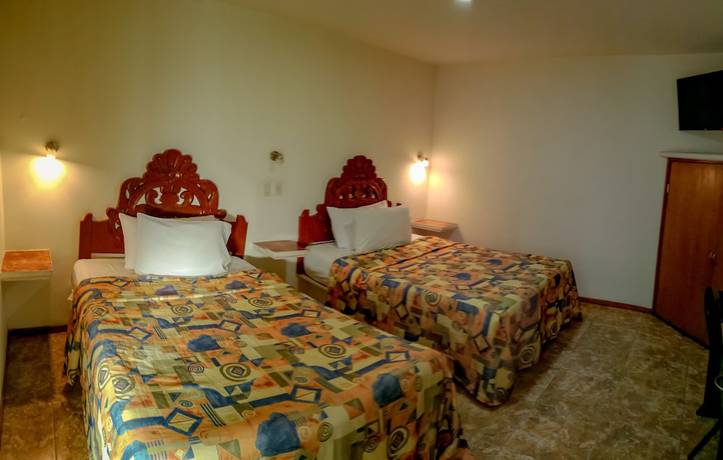 Imagen de la habitación del Hotel Royal Puebla. Foto 14