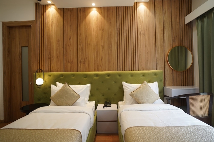 Imagen de la habitación del Hotel Royal Residence HUDA City Centre, Gurugram. Foto 7