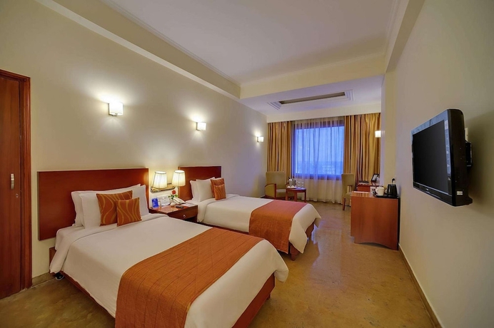 Imagen de la habitación del Hotel Royal Sarovar Portico Siliguri. Foto 8