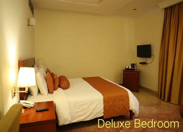Imagen de la habitación del Hotel Royal Sarovar Portico Siliguri. Foto 9