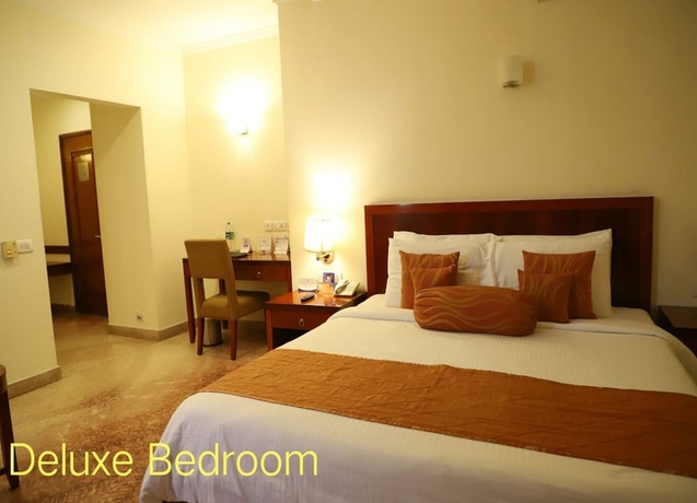 Imagen de la habitación del Hotel Royal Sarovar Portico Siliguri. Foto 11