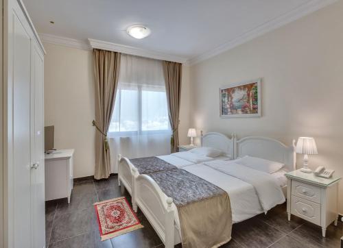 Imagen de la habitación del Hotel Royal, Sharjah. Foto 17