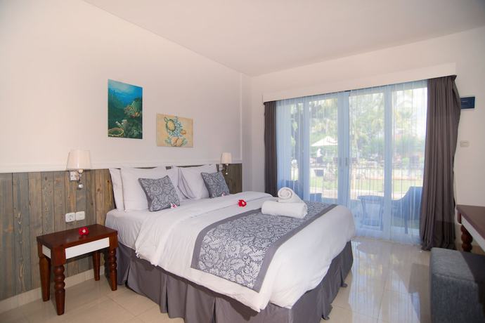 Imagen de la habitación del Hotel Royal Singosari Villa Karang. Foto 3