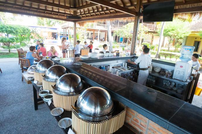 Imagen del bar/restaurante del Hotel Royal Singosari Villa Karang. Foto 2