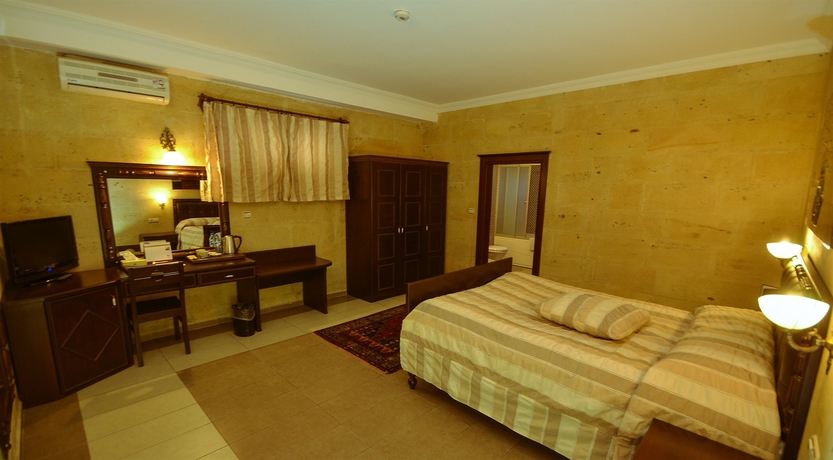 Imagen de la habitación del Hotel Royal Stone Houses - Goreme. Foto 11