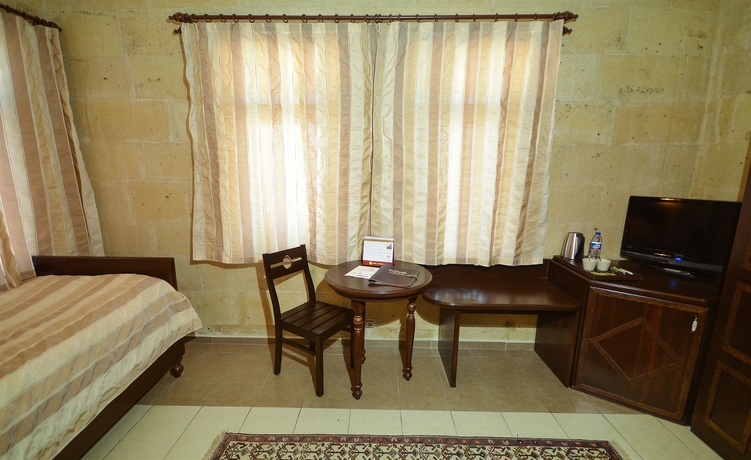 Imagen de la habitación del Hotel Royal Stone Houses - Goreme. Foto 12