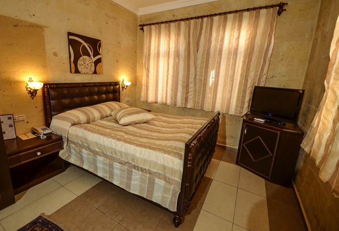 Imagen de la habitación del Hotel Royal Stone Houses - Goreme. Foto 13