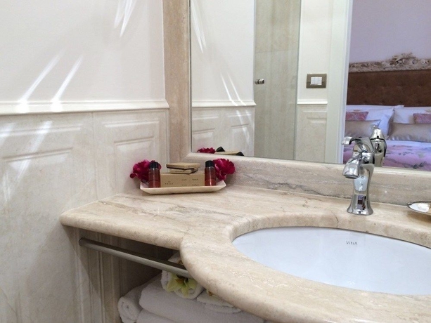 Imagen de la habitación del Hotel Royal Suite Trinità Dei Monti. Foto 4