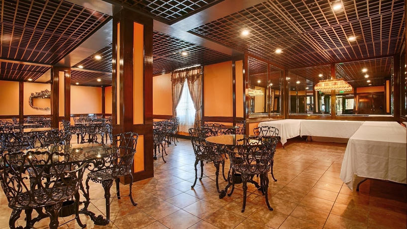 Imagen del bar/restaurante del Hotel Royal Suites, Baton Rouge. Foto 3