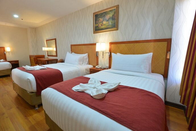 Imagen de la habitación del Hotel Royal Suites Condotel. Foto 2