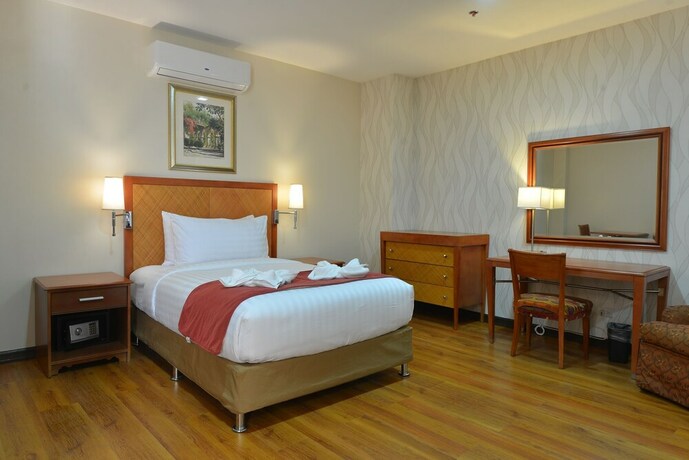 Imagen de la habitación del Hotel Royal Suites Condotel. Foto 4