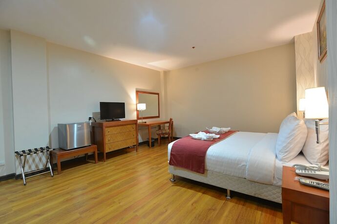 Imagen de la habitación del Hotel Royal Suites Condotel. Foto 12