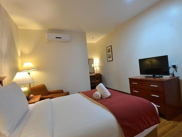 Imagen de la habitación del Hotel Royal Suites Condotel. Foto 15