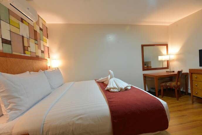 Imagen de la habitación del Hotel Royal Suites Condotel. Foto 18