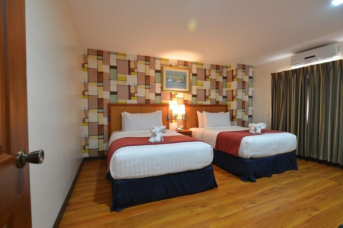 Imagen de la habitación del Hotel Royal Suites Condotel. Foto 19