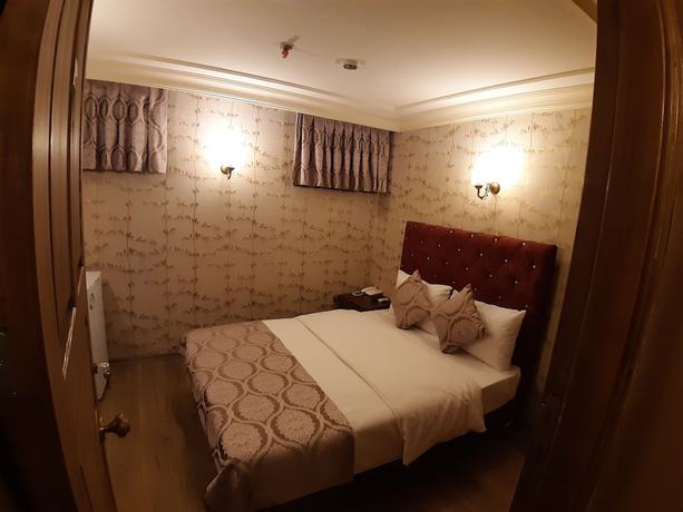 Imagen de la habitación del Hotel Royal Suites Sultanahmet. Foto 9