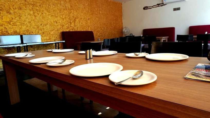 Imagen del bar/restaurante del Hotel Royal Suites by Park Tree Chakki Mor. Foto 4